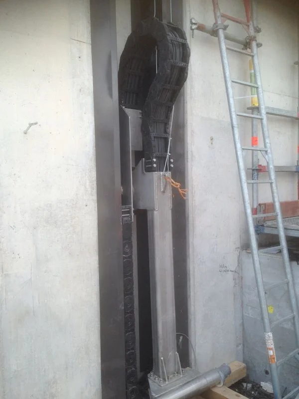 The cable carrier in the narrow shaft of the pier