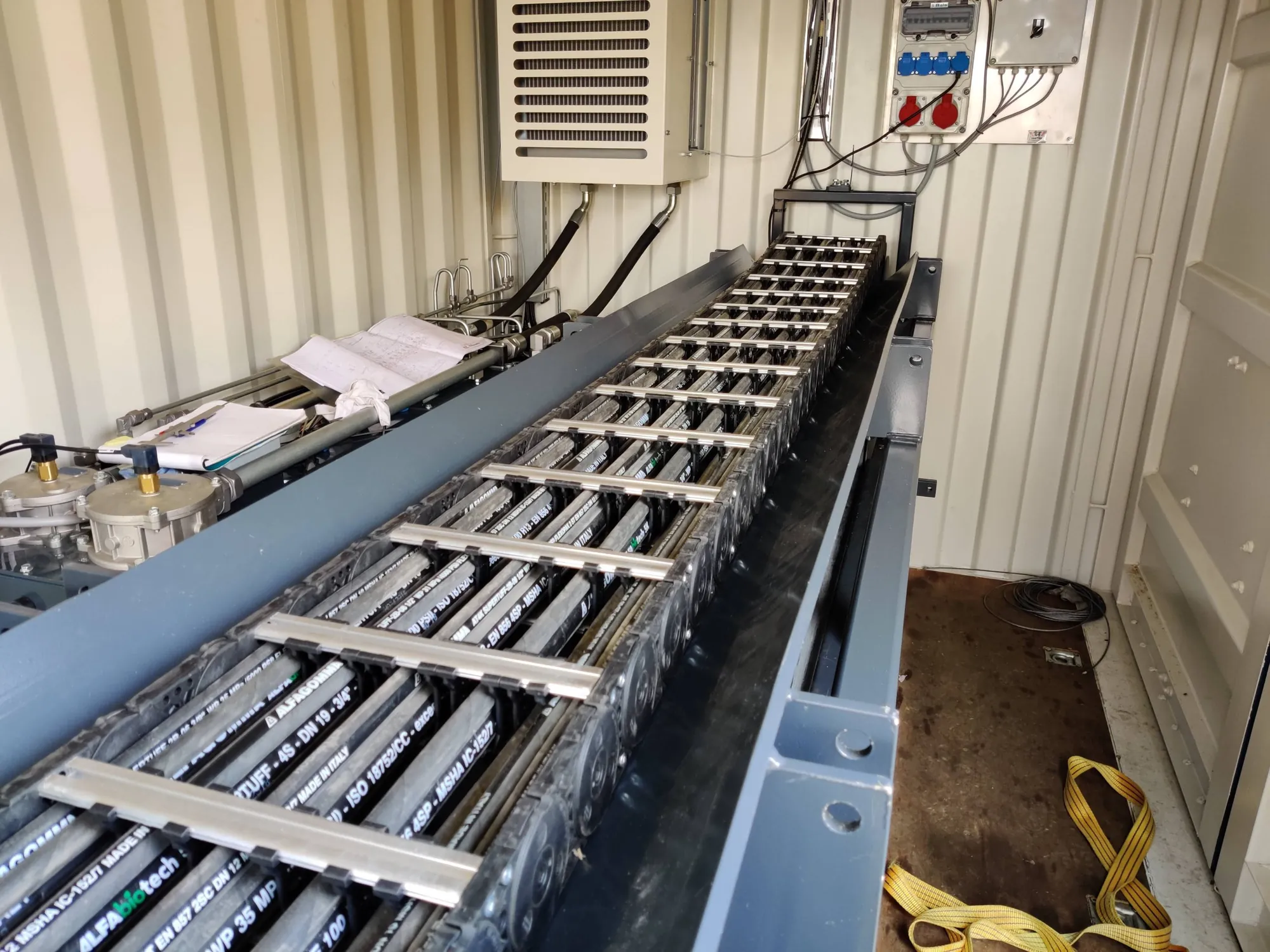The cable carrier in the channel inside the container