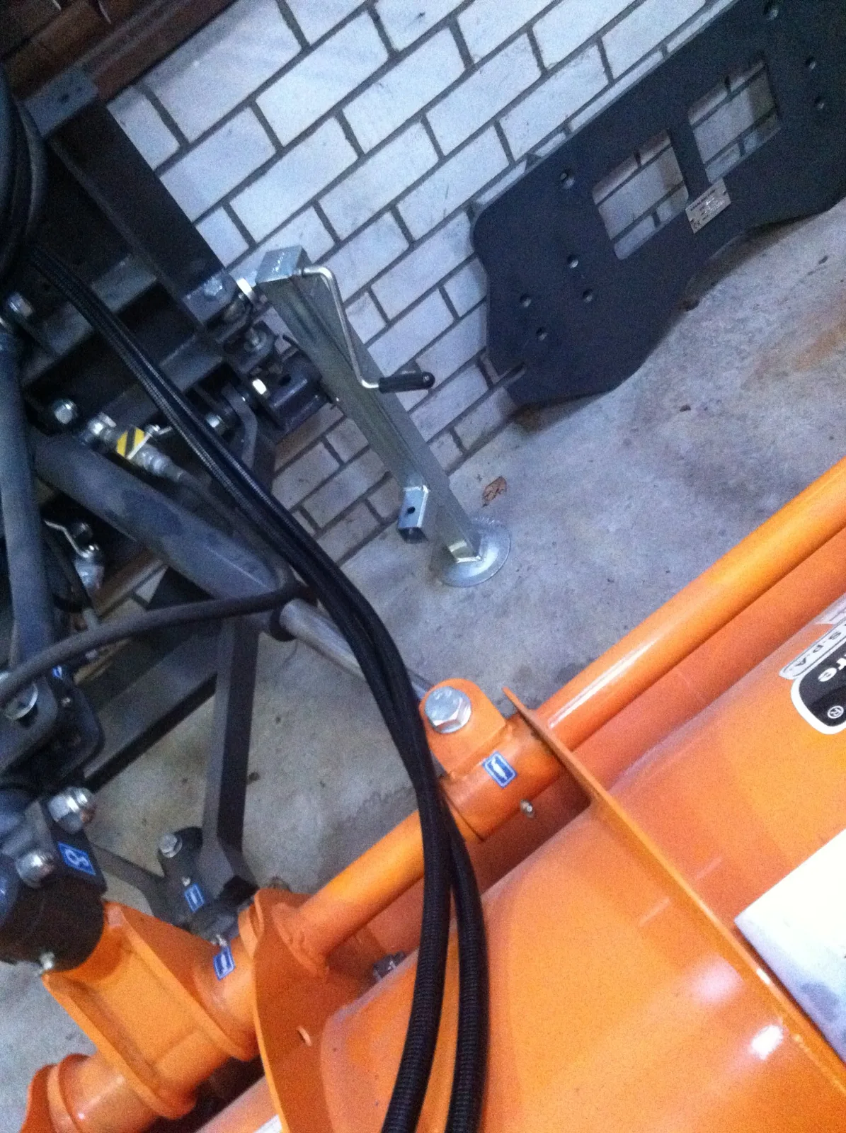 The hoses from the frame to the blade