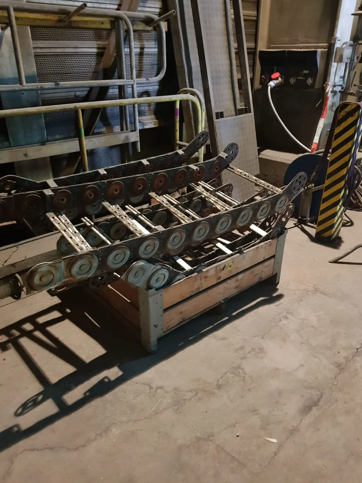 The old, worn cable carrier after the replacement